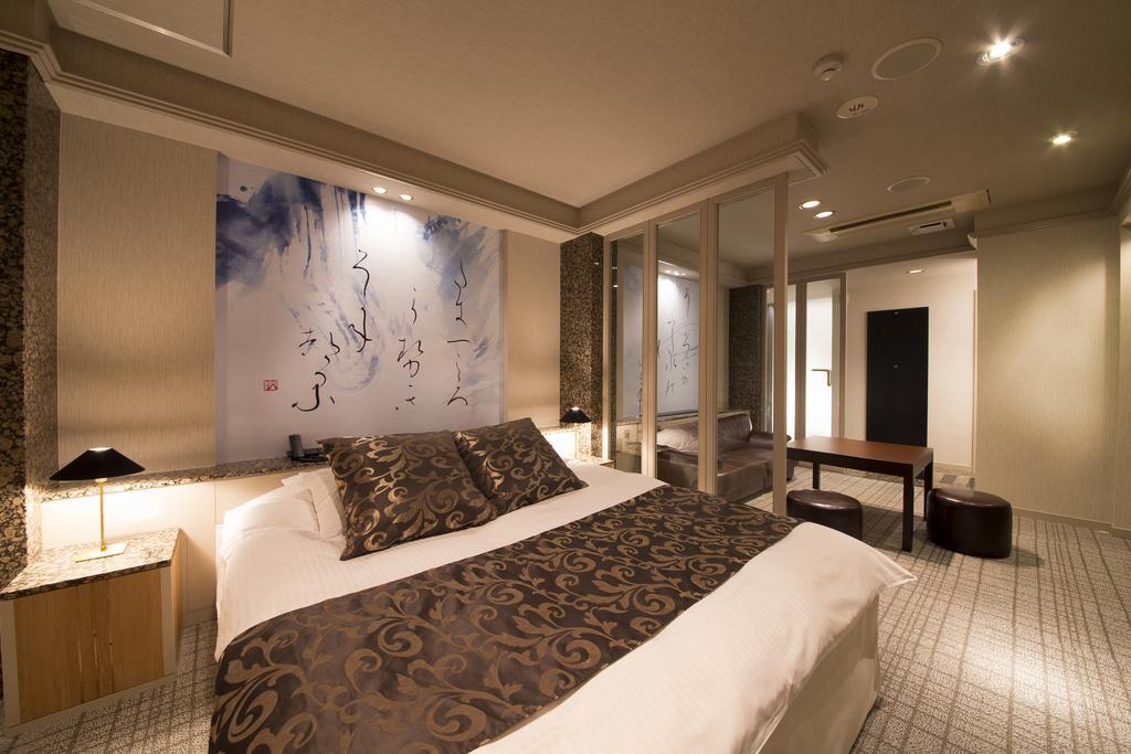 Hotel Beni East (Adults Only) Осака Стая снимка
